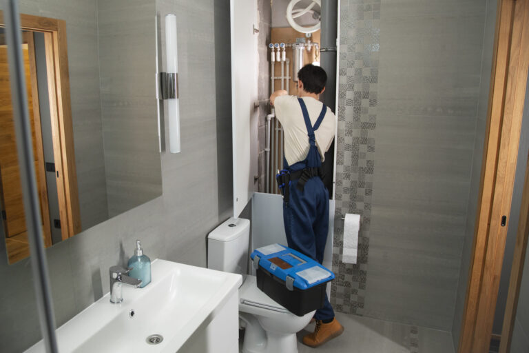 male-plumber-working-fix-problems-client-s-house